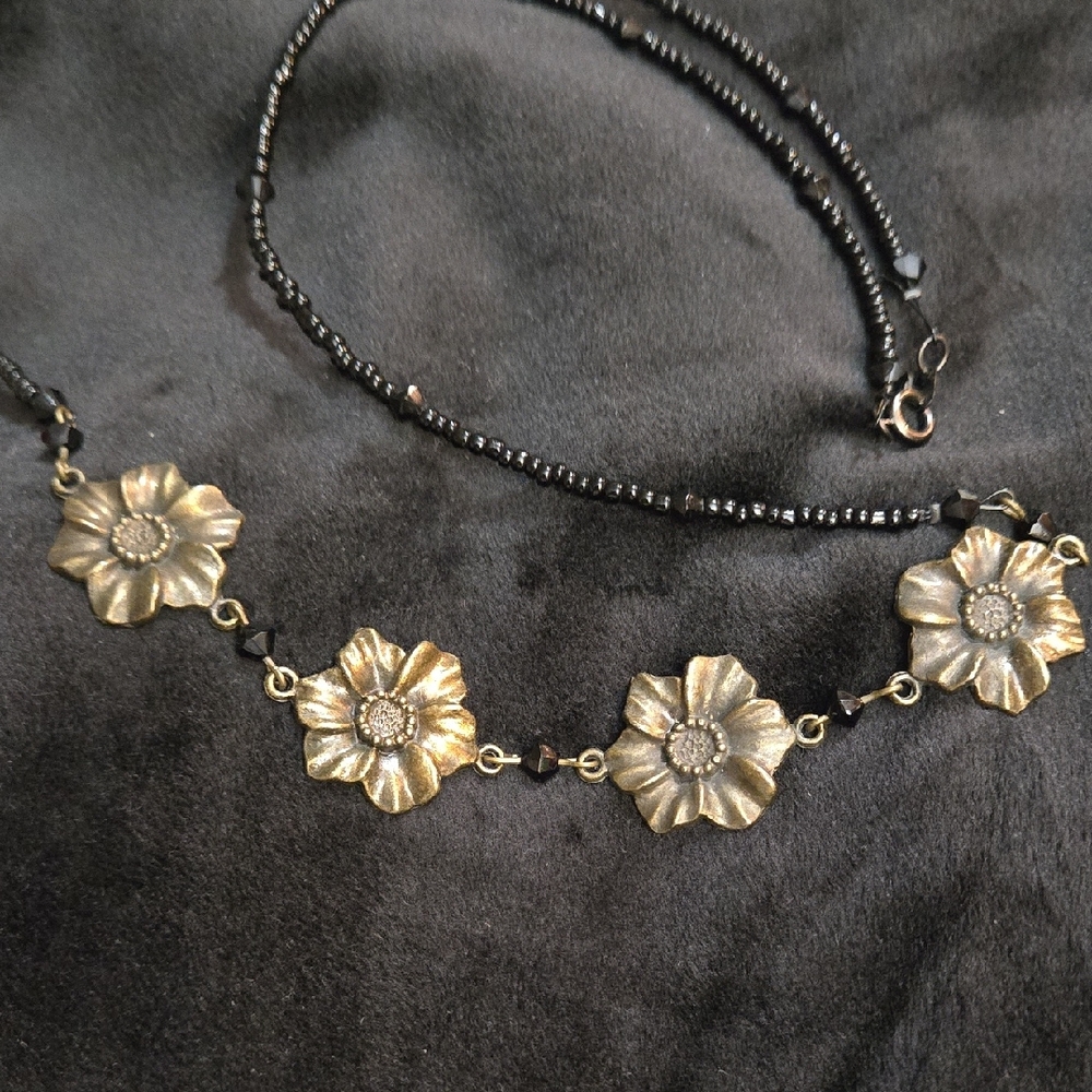 Elegant Bronze Tone Floral Necklace With Black Beads.